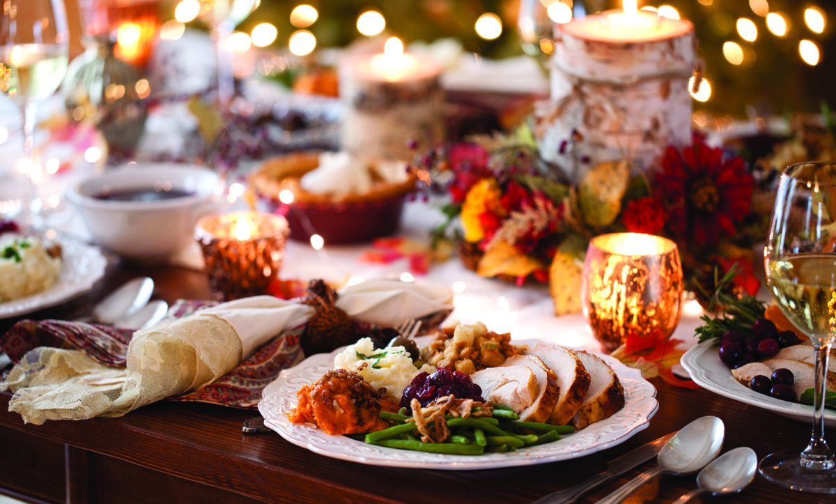 Thanksgiving foods at the dining table, ready to be eaten. 